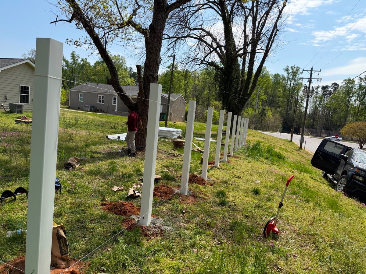 Fence layout and setting by JMO Construction LLC